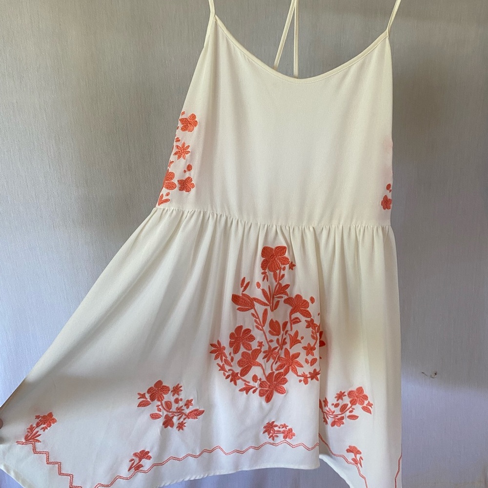 White dress with coral details